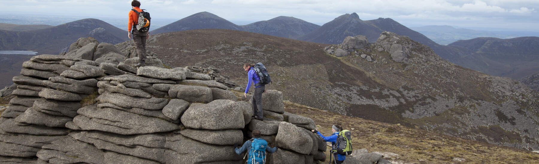Mixed gender group of young (20-25) Walkers on Slieve Binnian, Mourne Mountains, Co Down, Northern Ireland
