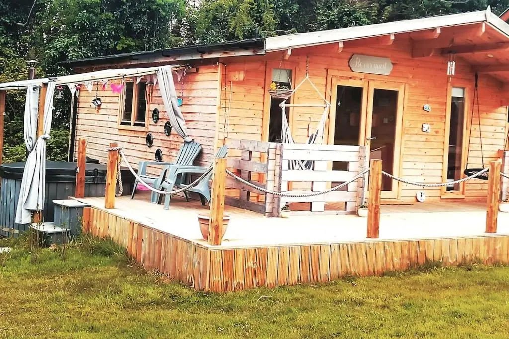 Luxury log cabin with wood fired hot tub
